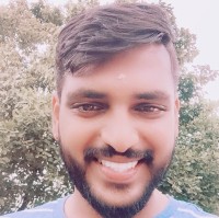 Vasu T
