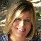 Suzanne M Carson