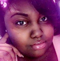 Travishia Isom