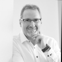 Christian Frick, CMC