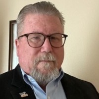 Russ Downing, USN (Ret.) CDPM