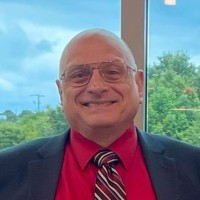Dennis Rhoades, DO, FACMQ, RMC