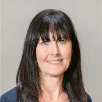 Traci E.