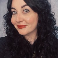 Kat R.
