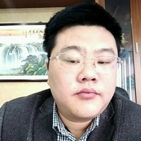 张广金