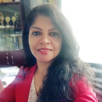 Dr. Bina T