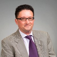 Nicholas D.