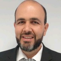 Luis E. Gómez Baca