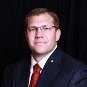 Travis L. Higgins