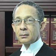 Dexter Theodore KC
