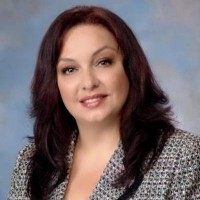 Zoey Tolu, Realtor. Helping You Buy And Sell Real Estate.