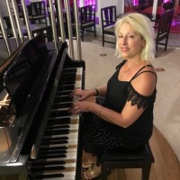 Carrie Lyn Bouzide-Unger