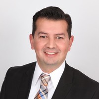 Raymond E. Uman