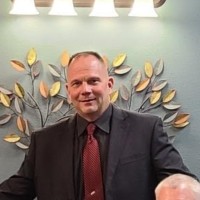 Brian J Knapek