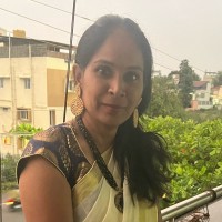 Aruna M