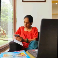 Akhila E