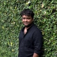 Suman B