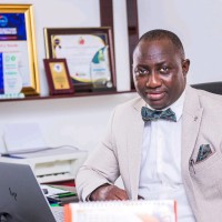 Raymond Osho  MD, MBA(Fin), FIHFM