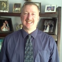 Dan E.