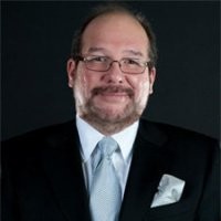 Raul A. Salazar, Ph.D. CFI.