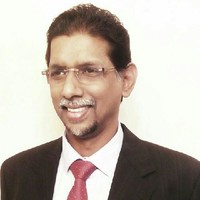 John T George