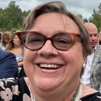 Beth Slucher, Med