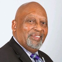 William M. Brown III, FAIA, NOMAC