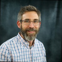 Chris Magnuson (he/him)