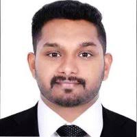 Tom Mathew