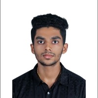 Amal K M