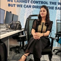 Nisha T