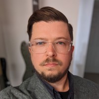 Thomas (TJ) Guzik