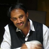 R K Acharya