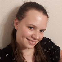 Laura E.