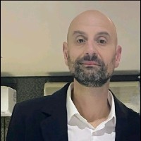 Travis B.