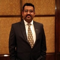 Manish B.