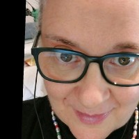 Carla Xavier (She/Her)