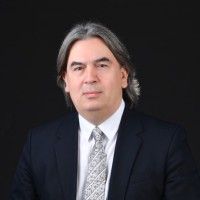 ILHAN YILMAZ, PhD(Exon), LL.M.