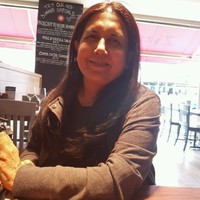 Dr Mala Singh