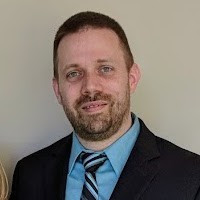 Dan E.