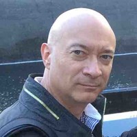 Adrian Cadman MCMI ChMC, MBA, ACMA