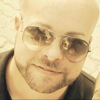 Justin M. Shew
