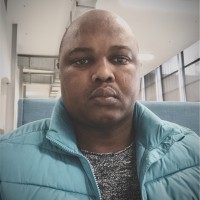 Andile Dini