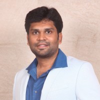 Dhinesh P.