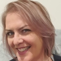 Christine Coura (she/her/ia)