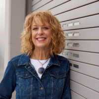 Valerie E. Weber,  PhD, MA, MAOM