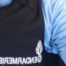 J B
