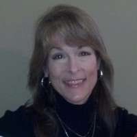 LAURIE GRESHAM
