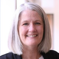 Julie Bandy, AIC, AINS, AIC-M