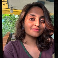 Nidhi B